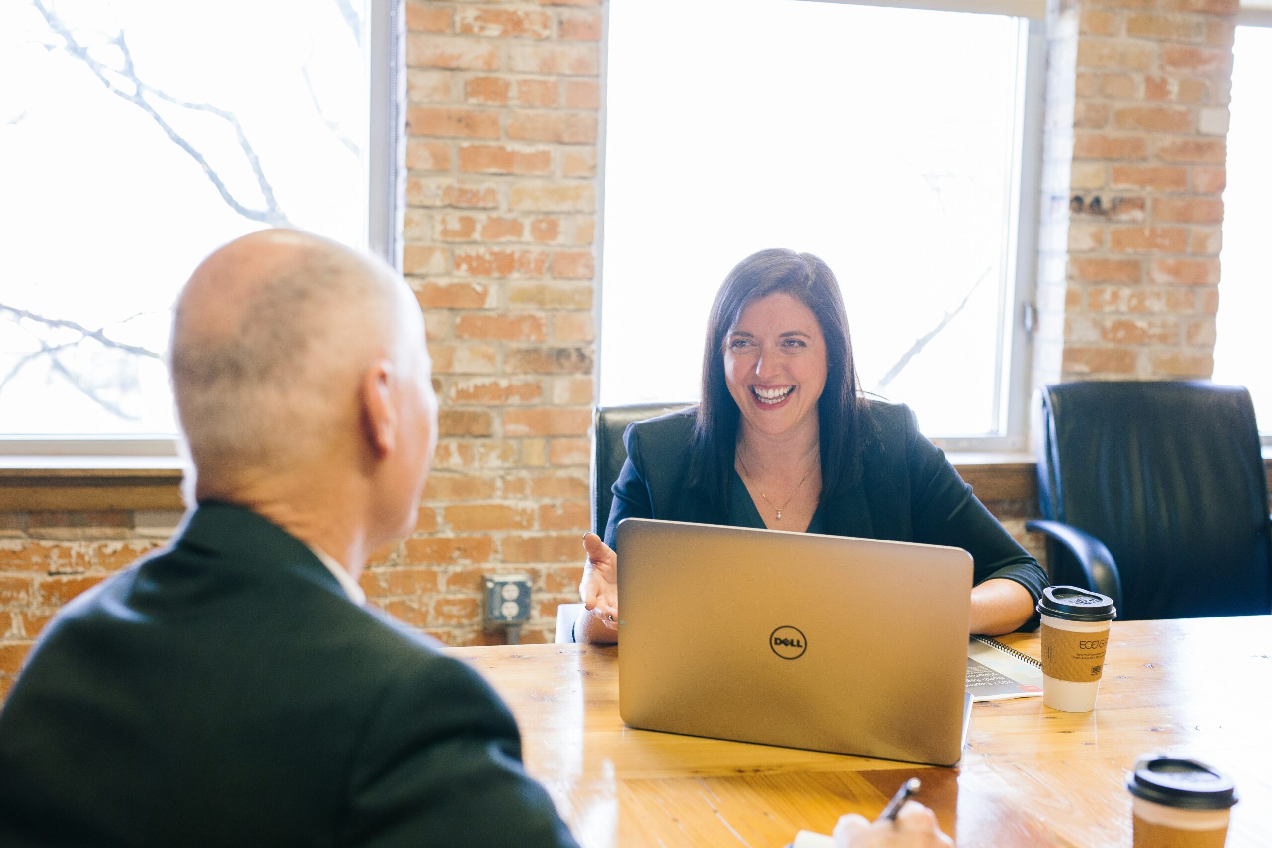 Image of a consultant meeting a client
