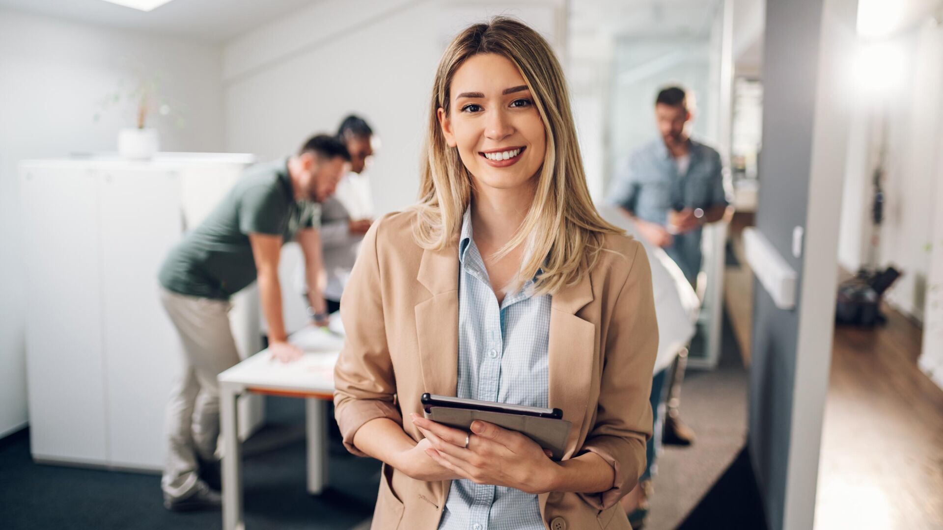 A professional from an international background, standing in a bustling Berlin street, holding a resume and smiling confidently